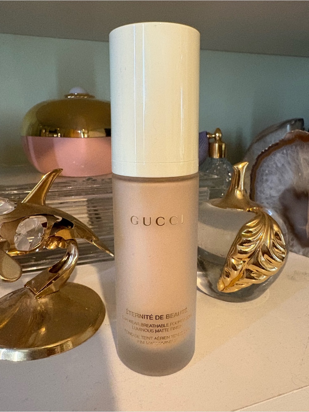 New Gucci Foundation Bottle in Cream and Gold Accents